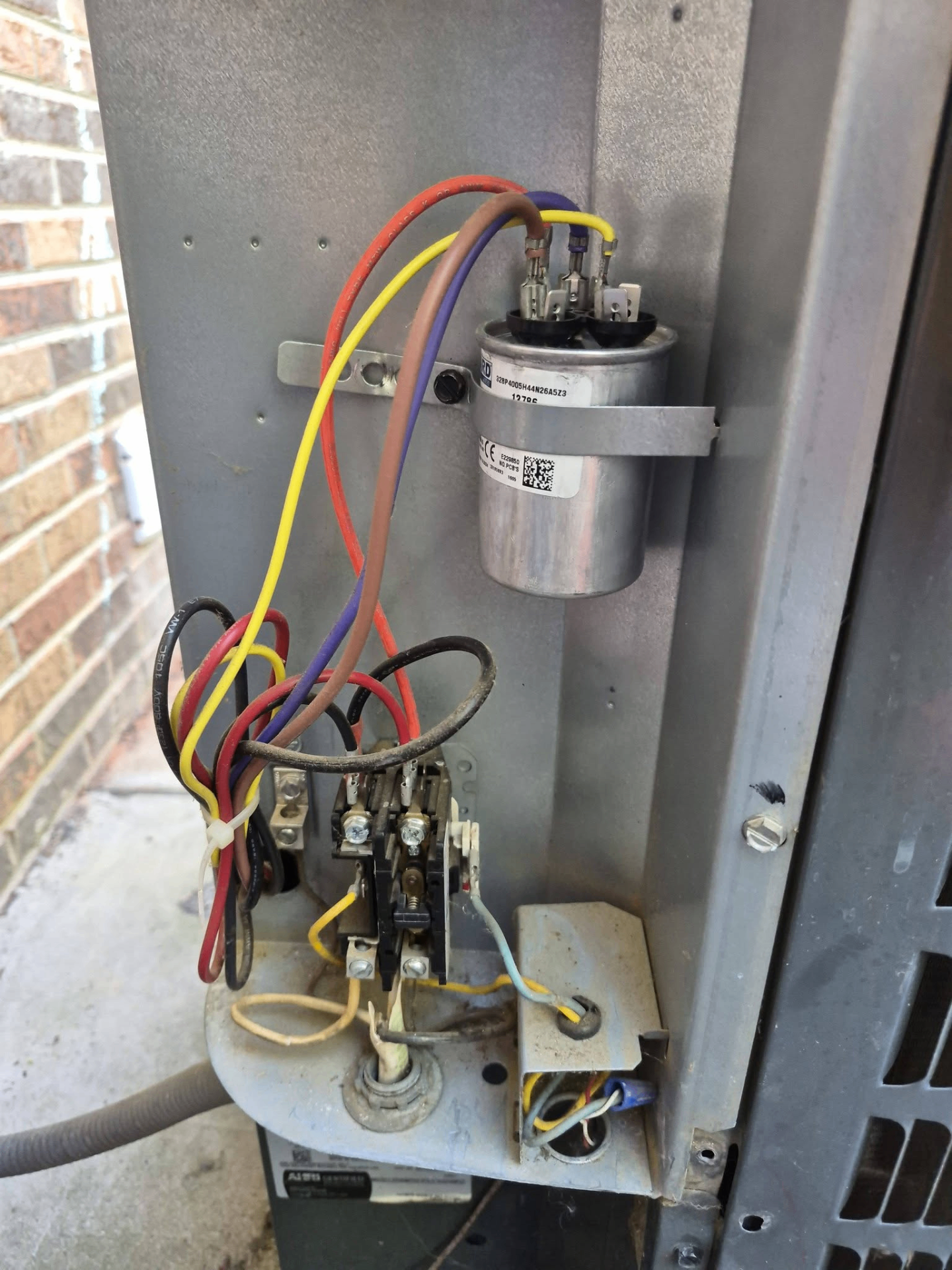 Capacitor and contactor wiring on outdoor HVAC unit