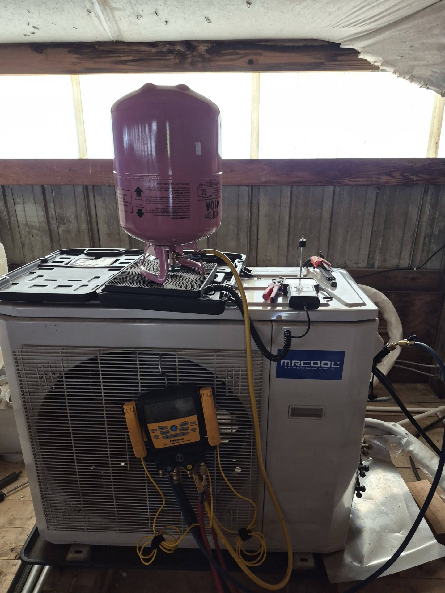 MRCOOL system under vacuum with field gauges and recovery setup